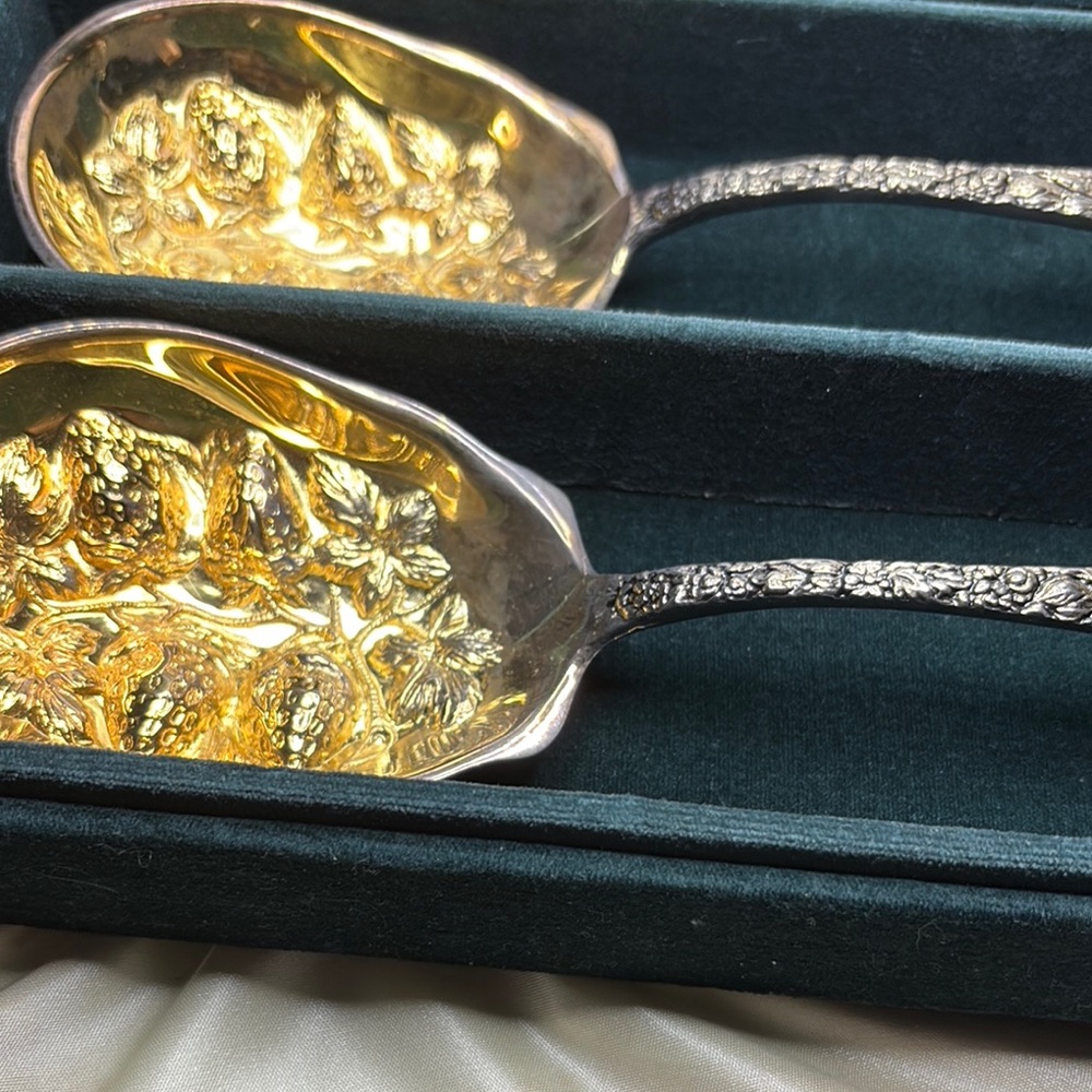 Ornate Silver and Gold Serving Spoons
